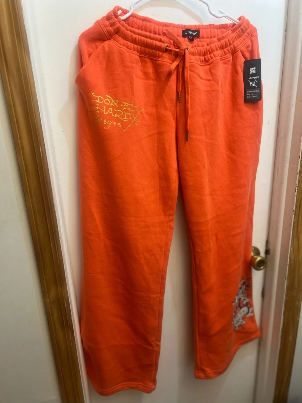 This Vibrant Orange Ed Hardy Drawstring Sweat Pant is Available 🧡